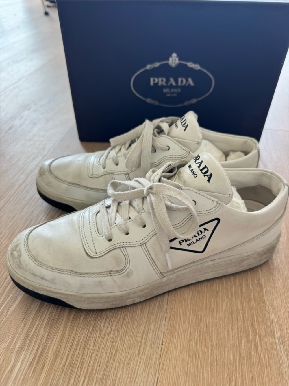 Prada White Leather Low-Top Sneakers with Black Logo